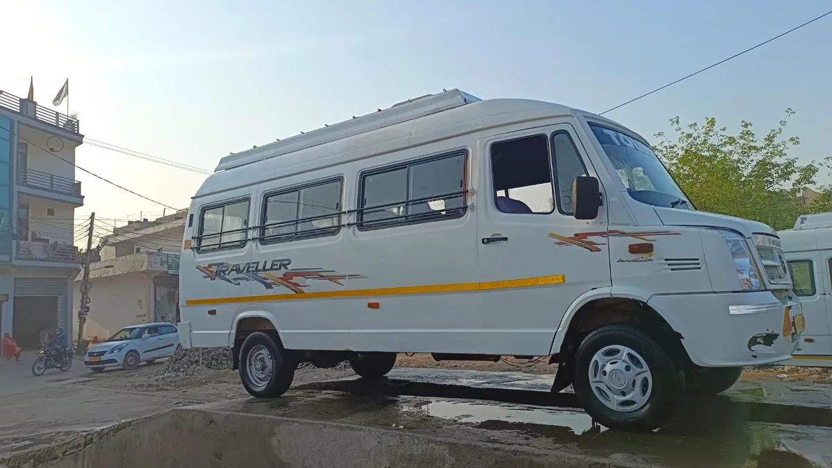 12 seater Force Tempo Traveller parked, side view